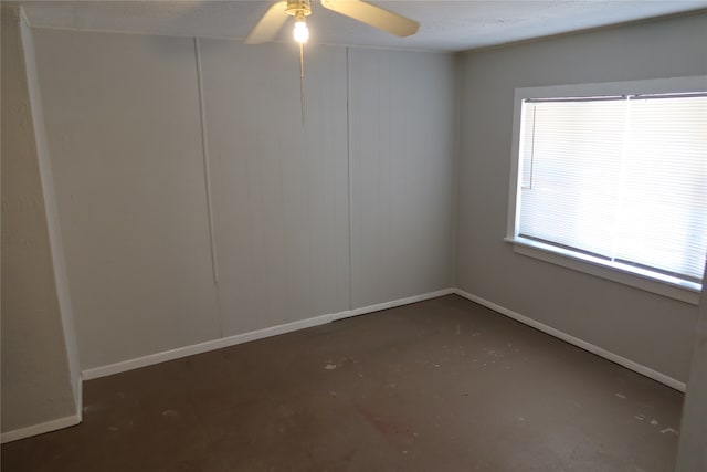 unfurnished room featuring ceiling fan