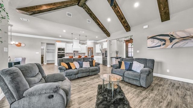 living room with high vaulted ceiling, beam ceiling, and light hardwood / wood-style flooring