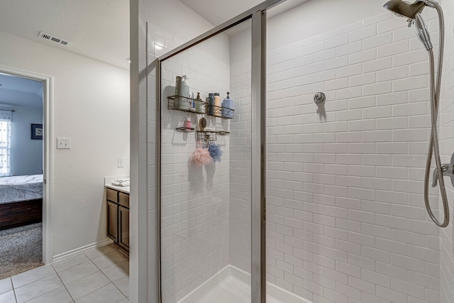 full bathroom with tile patterned floors, toilet, shower / bath combo with shower curtain, and vanity