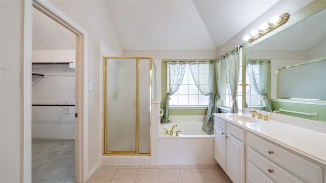 bathroom featuring lofted ceiling, tile patterned flooring, vanity, and plus walk in shower