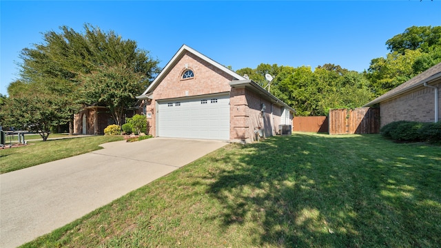 view of front facade featuring a front lawn, central AC unit, and a garage