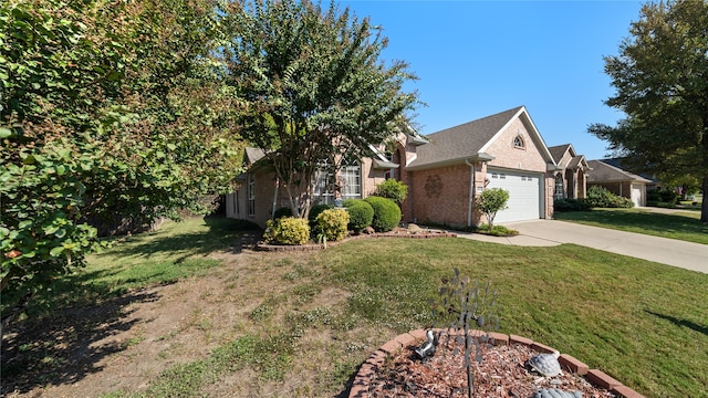 obstructed view of property with a front yard and a garage