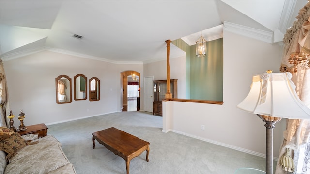 living room featuring light colored carpet, a notable chandelier, lofted ceiling, and ornamental molding