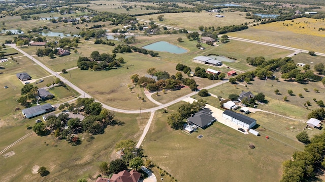 birds eye view of property featuring a rural view