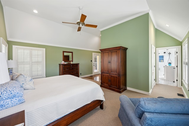 carpeted bedroom with crown molding, connected bathroom, and ceiling fan