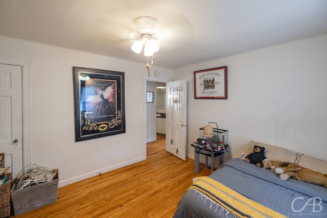 bedroom featuring wood-type flooring