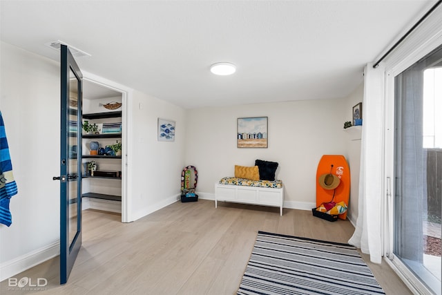 living area featuring light hardwood / wood-style flooring