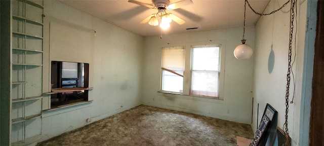 2119 N Woods St, Sherman, TX 75092 - unfurnished living room featuring ceiling fan and visible vents