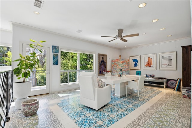 interior space featuring ornamental molding, access to outside, and ceiling fan