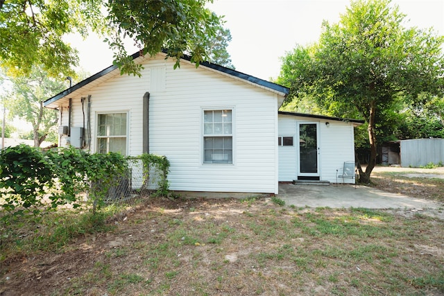 rear view of property with a patio