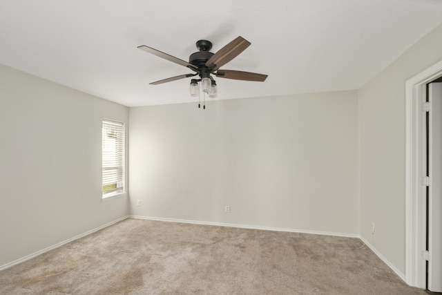 unfurnished room with light carpet and ceiling fan