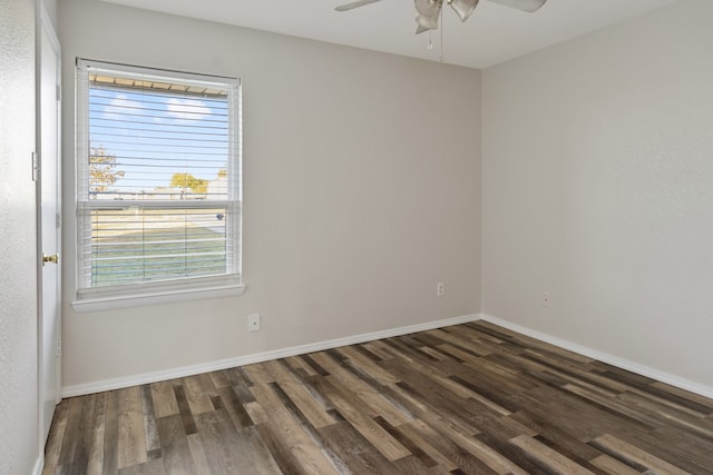 unfurnished room featuring ceiling fan and dark hardwood / wood-style flooring