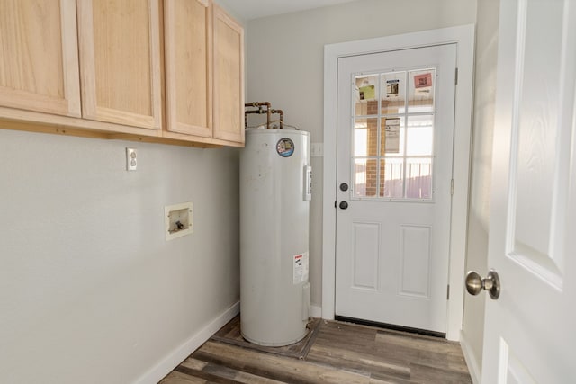 laundry area featuring light hardwood / wood-style floors, electric water heater, washer hookup, and cabinets