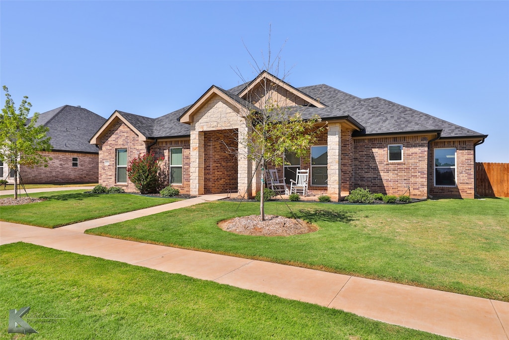 view of front of property with a front lawn