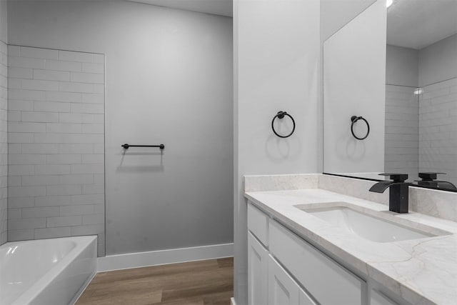 bathroom featuring wood-type flooring and vanity