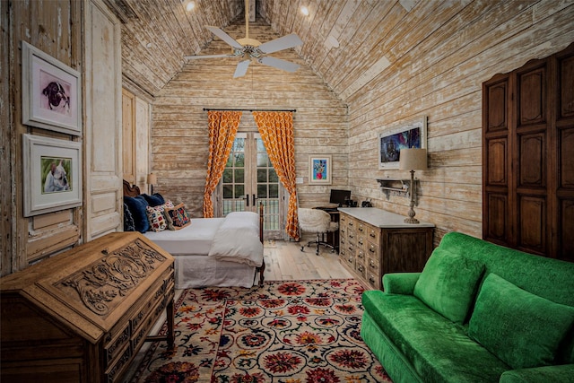 3801 Dugas Rd, Aubrey, TX 76227 - bedroom with light wood-type flooring, wood walls, lofted ceiling, and wooden ceiling