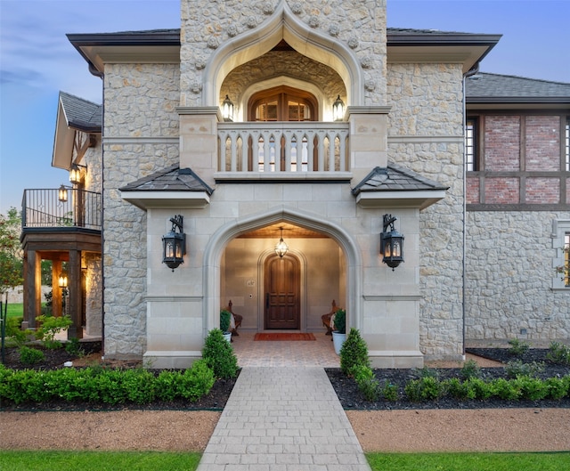 doorway to property with a balcony