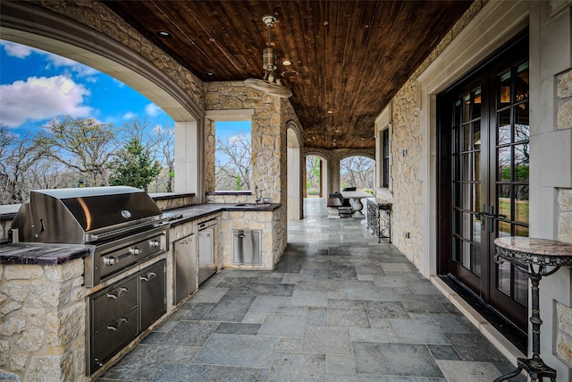 3801 Dugas Rd, Aubrey, TX 76227 - view of patio / terrace featuring french doors, a sink, exterior kitchen, and grilling area