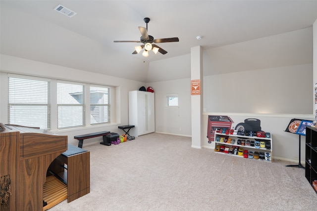 playroom with vaulted ceiling, carpet, and ceiling fan