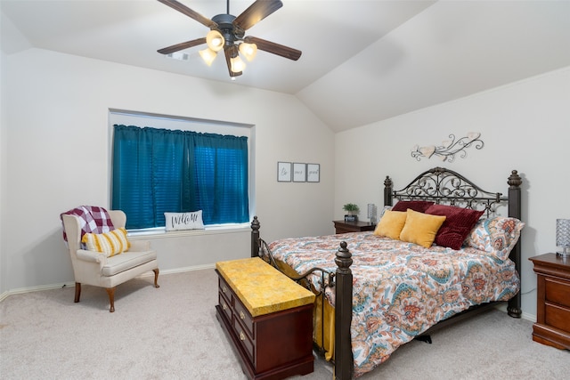 bedroom featuring ceiling fan, light colored carpet, and lofted ceiling