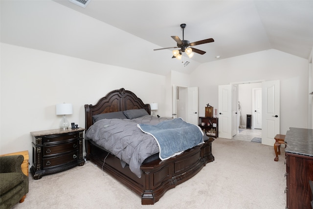 bedroom with lofted ceiling, light carpet, and ceiling fan