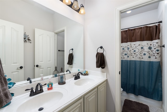 bathroom featuring toilet, vanity, and curtained shower