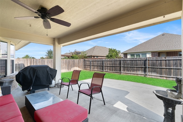 view of patio / terrace featuring area for grilling and ceiling fan