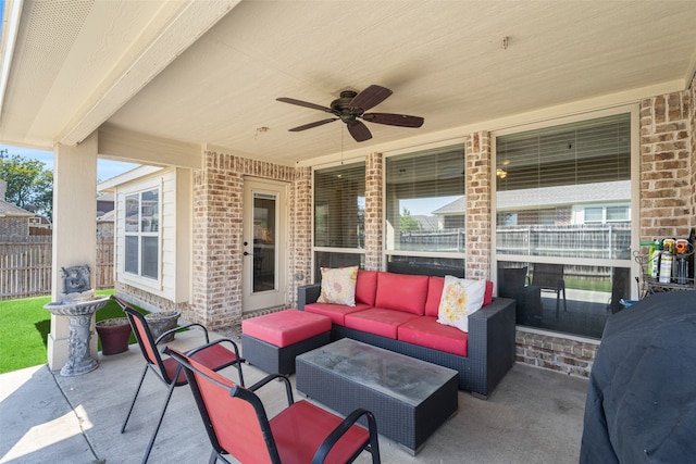 view of patio featuring an outdoor living space and ceiling fan