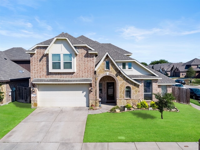 craftsman house featuring a garage and a front yard