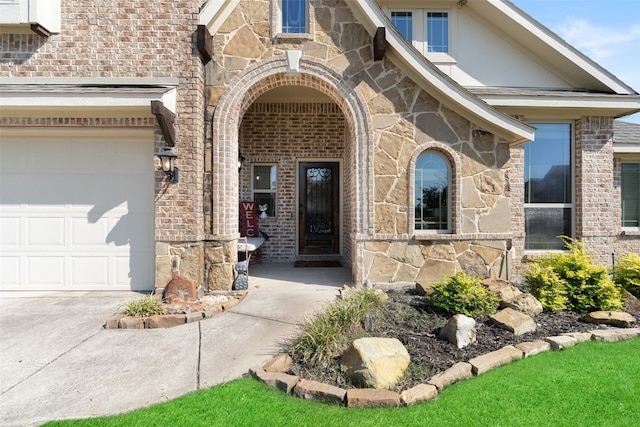 entrance to property featuring a garage