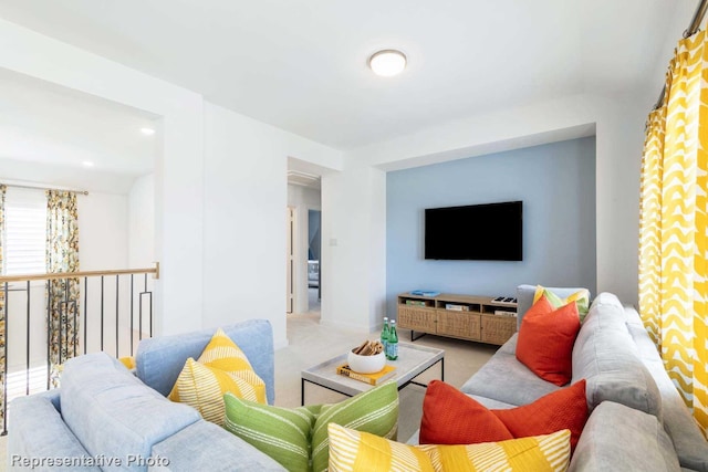 living room with light colored carpet