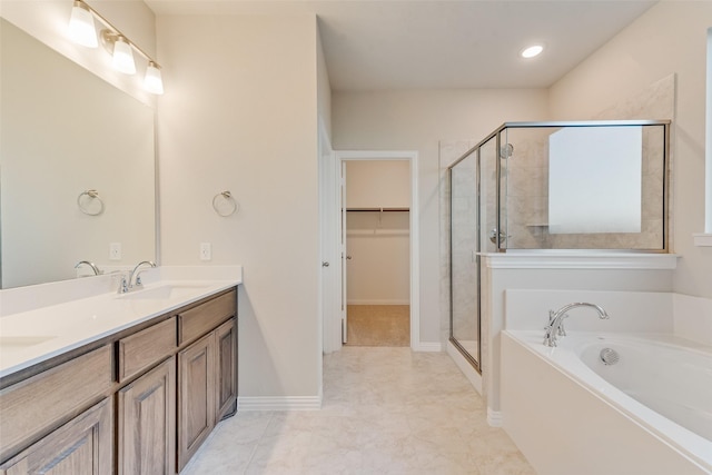 bathroom featuring vanity and plus walk in shower