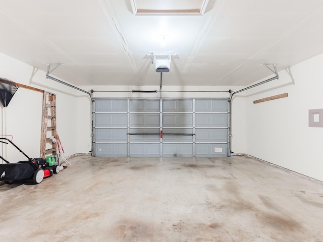 garage featuring a garage door opener