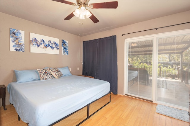 bedroom featuring access to exterior, ceiling fan, and light hardwood / wood-style flooring