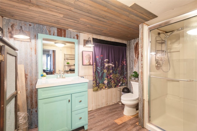 bathroom featuring hardwood / wood-style flooring, vanity, toilet, a shower with door, and wooden ceiling