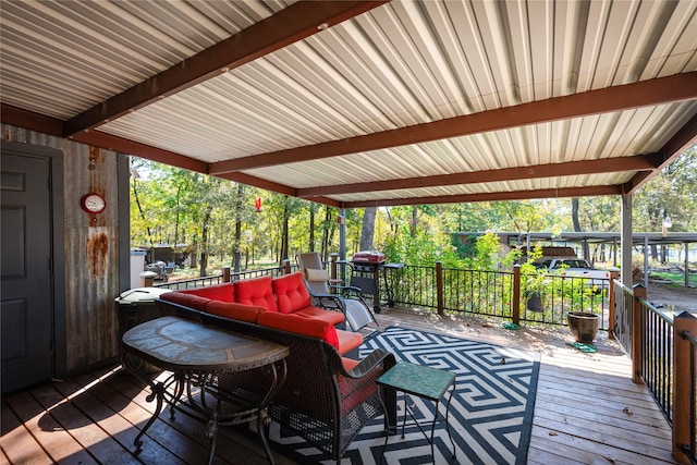 deck with an outdoor hangout area