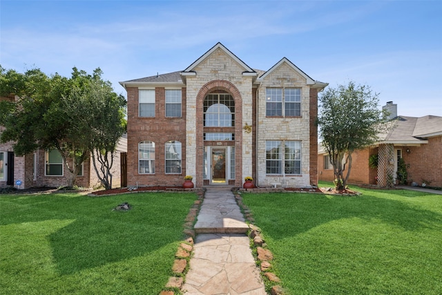 view of front of home featuring a front yard