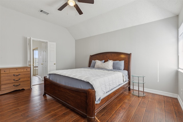 bedroom featuring lofted ceiling, ceiling fan, and dark hardwood / wood-style flooring