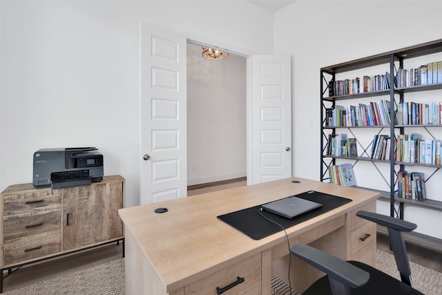 office space with hardwood / wood-style flooring