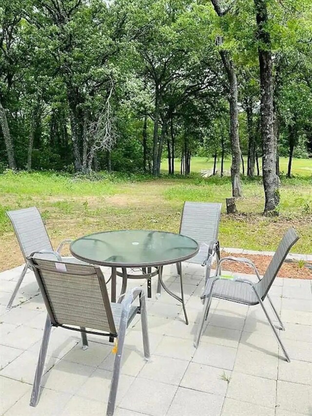207 Emberson Chapel Rd, Pilot Point, TX 76258 - view of patio / terrace with outdoor dining area