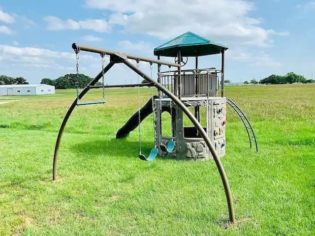 view of play area featuring a yard