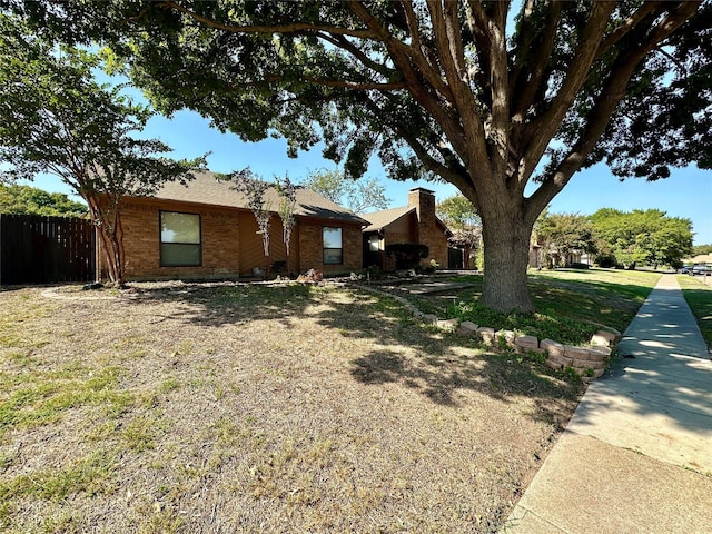 view of front of home with a front yard