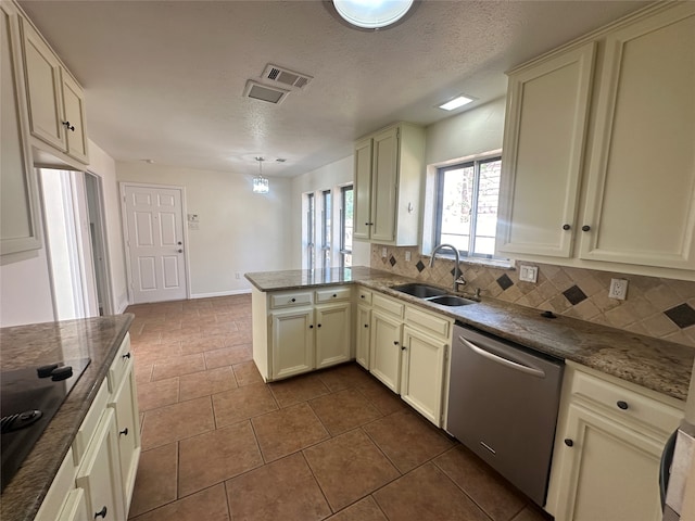 kitchen featuring sink, dishwasher, tasteful backsplash, kitchen peninsula, and pendant lighting