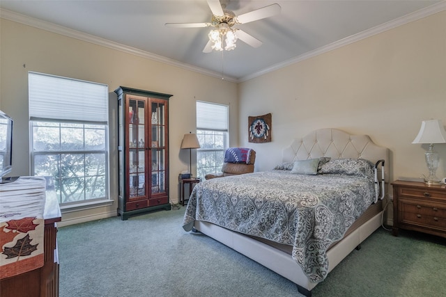 bedroom with crown molding, ceiling fan, and carpet