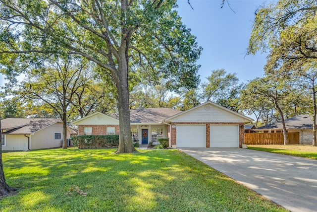 ranch-style house with a front yard and a garage