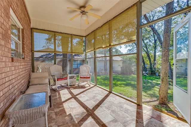 sunroom / solarium with ceiling fan