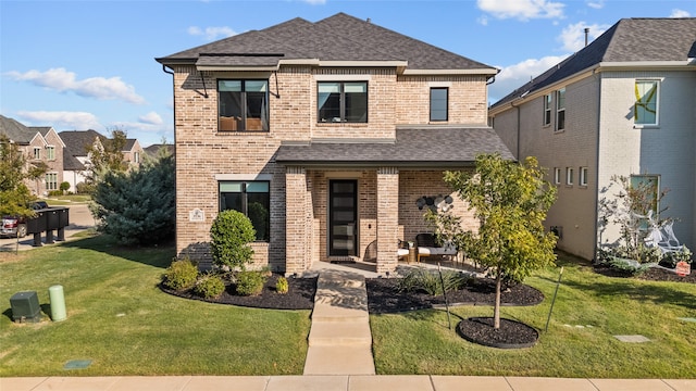 view of front of home featuring a front yard