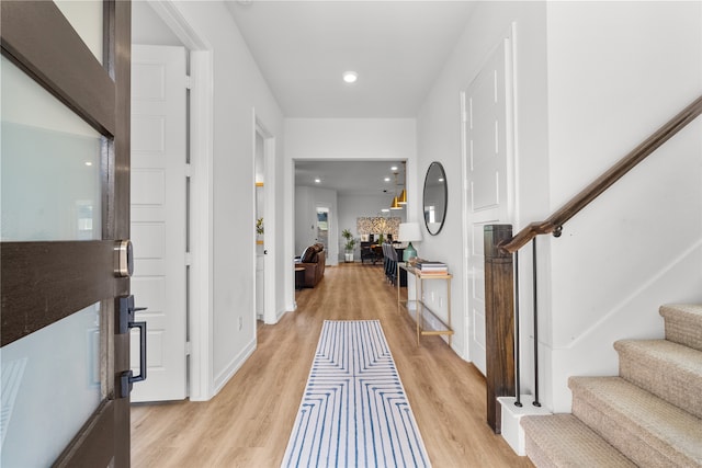 entrance foyer with light hardwood / wood-style floors