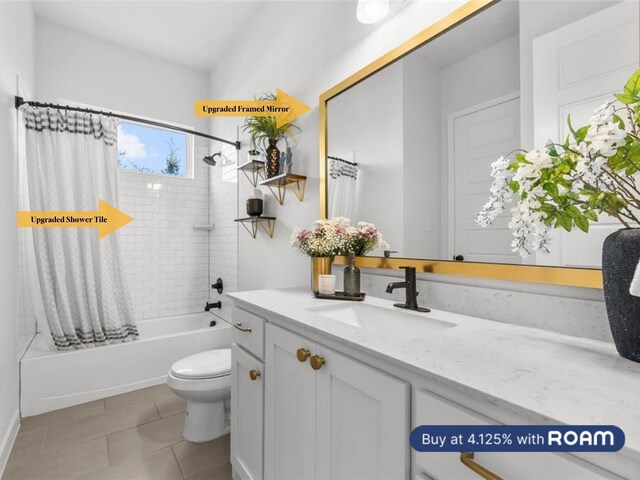 kitchen featuring light stone countertops, appliances with stainless steel finishes, a breakfast bar, white cabinetry, and an island with sink