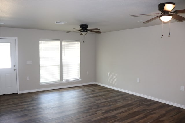 interior space with dark hardwood / wood-style floors and ceiling fan